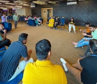 Udaan members seated in a circle during the first members' meet